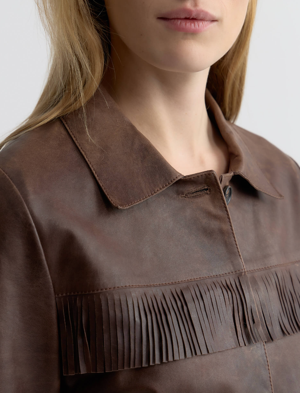 person wearing nili lotan womens dark brown Lazare Fringe Leather Jacket