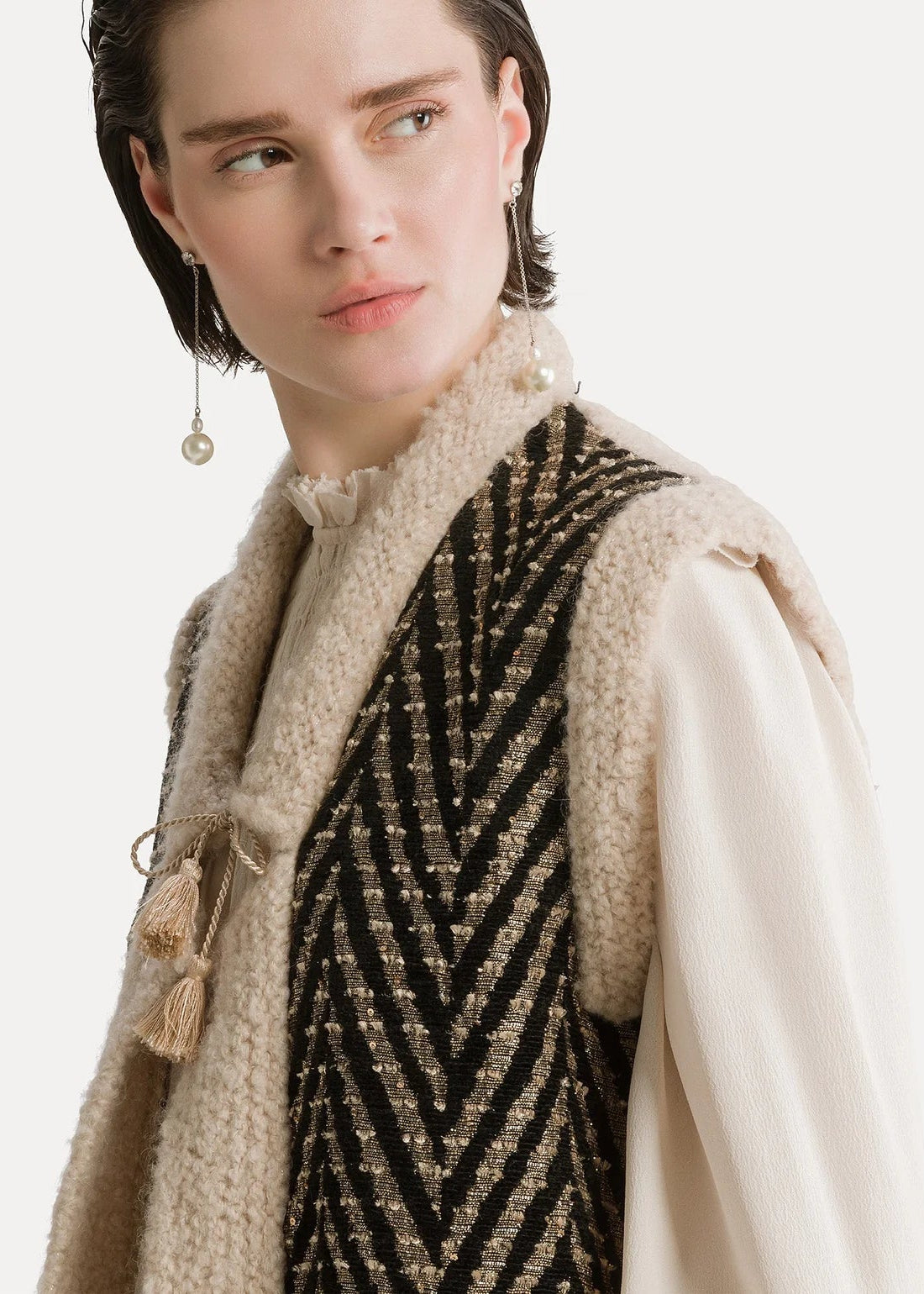 person wearing orte forte womens Chevron Jacquard Mix Knit Vest nero black