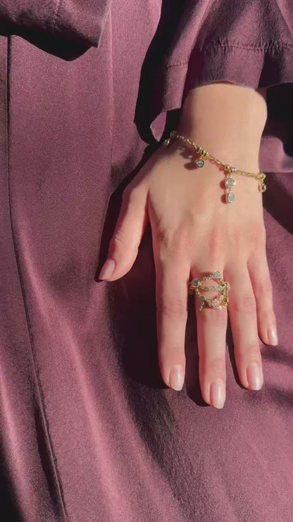 Person wearing Uniform Object fine jewelry 18k yellow gold diamonds Metal Web Ring and Diamond Dust Bracelet