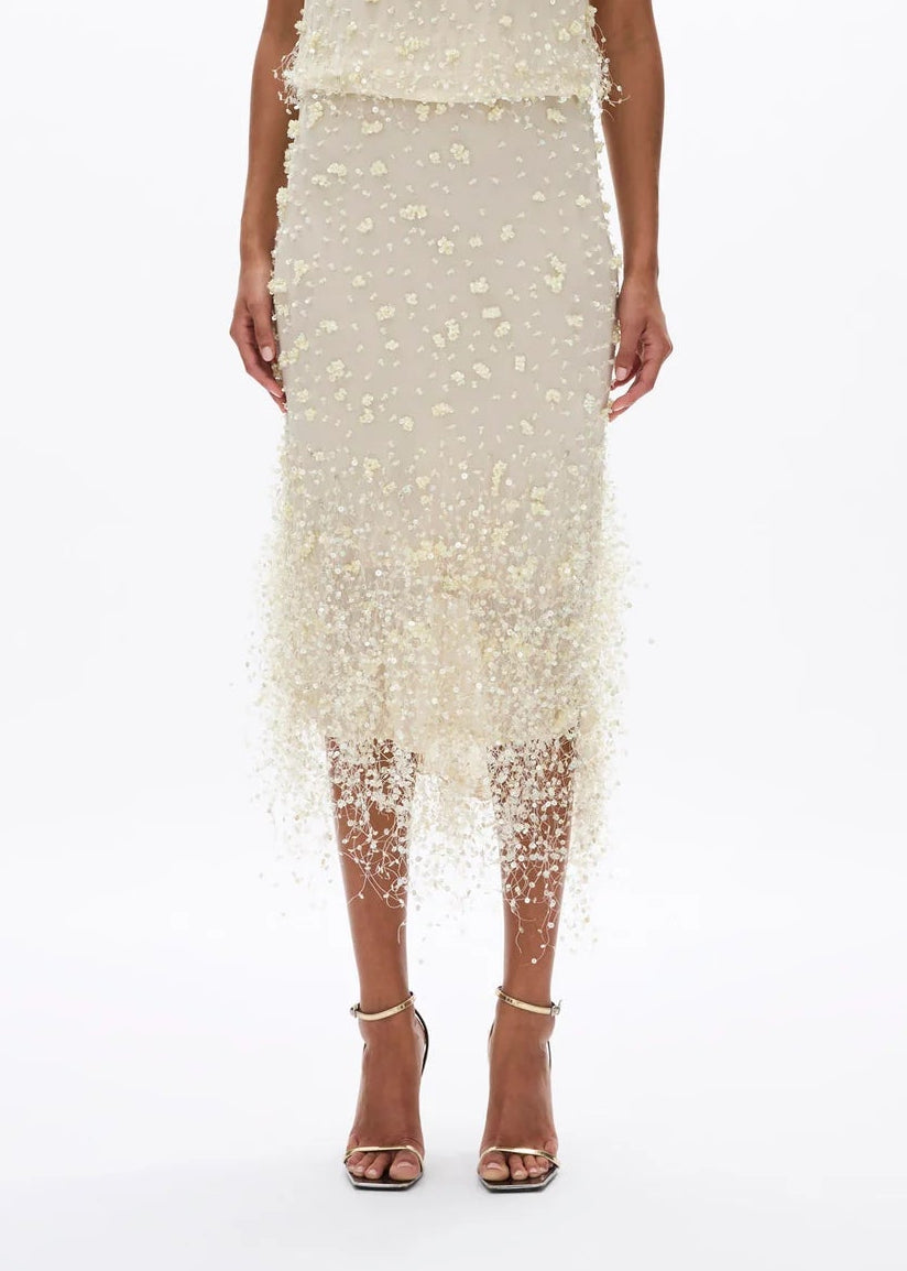 person wearing rachel gilbert womens embellished Anika Skirt in butter yellow