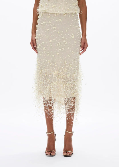 person wearing rachel gilbert womens embellished Anika Skirt in butter yellow