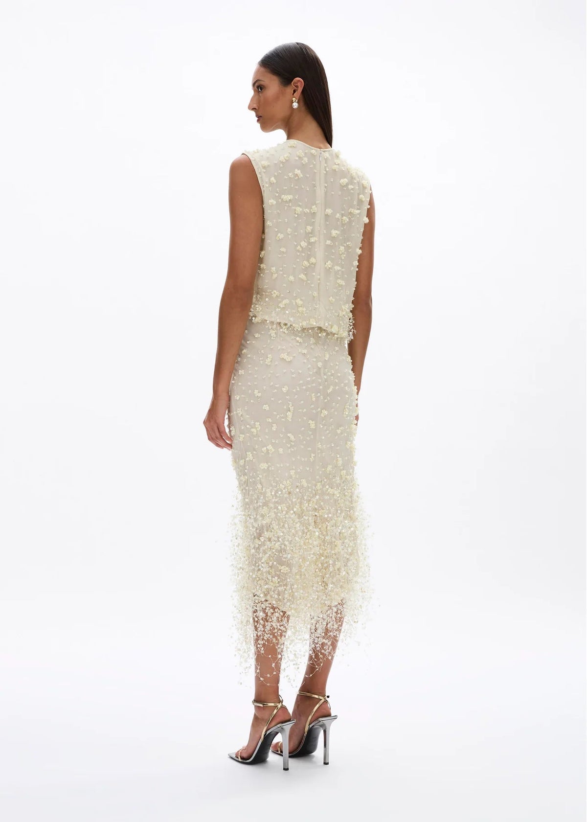 person wearing rachel gilbert womens embellished Anika Skirt in butter yellow