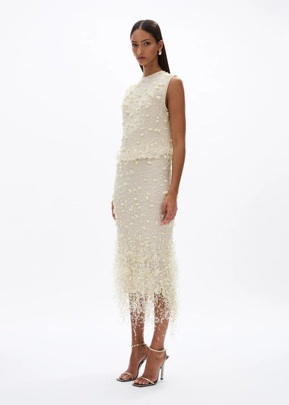 person wearing rachel gilbert womens embellished Anika Skirt in butter yellow