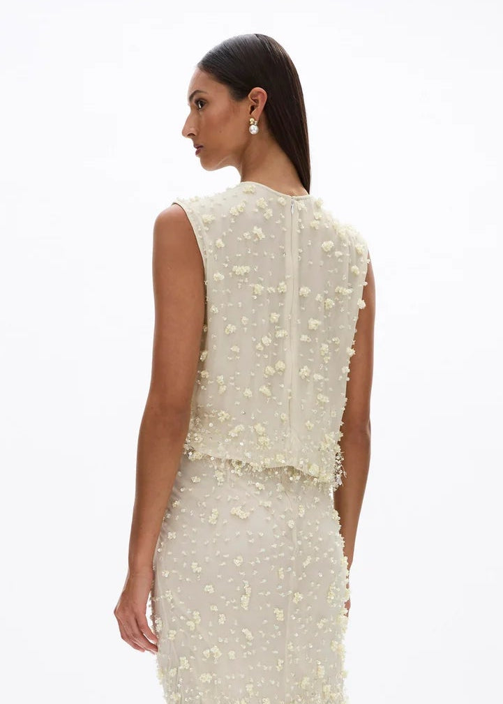 person wearing rachel gilbert womens embellished womens butter yellow