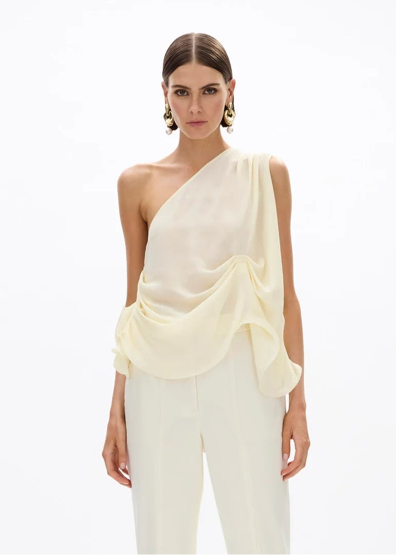 person wearing rachel gilbert womens silk Isla Top butter yellow