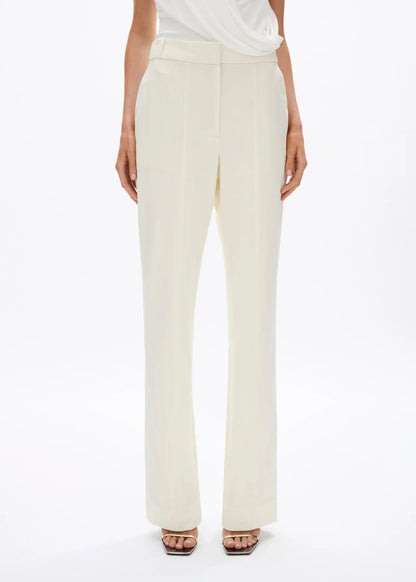 person wearing rachel gilbert womens stretch wool suiting Finley Pant in creme