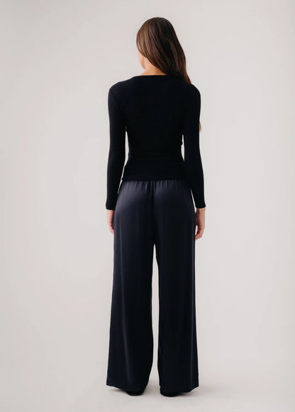 person wearing sablyn womens Brynn Wide Leg Silk Pant in Black