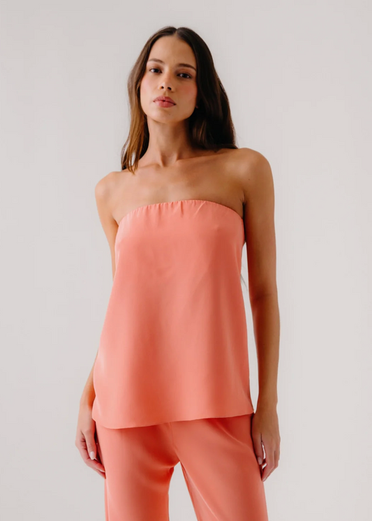 person wearing sablyn womens Camden Silk Strapless Top in melon