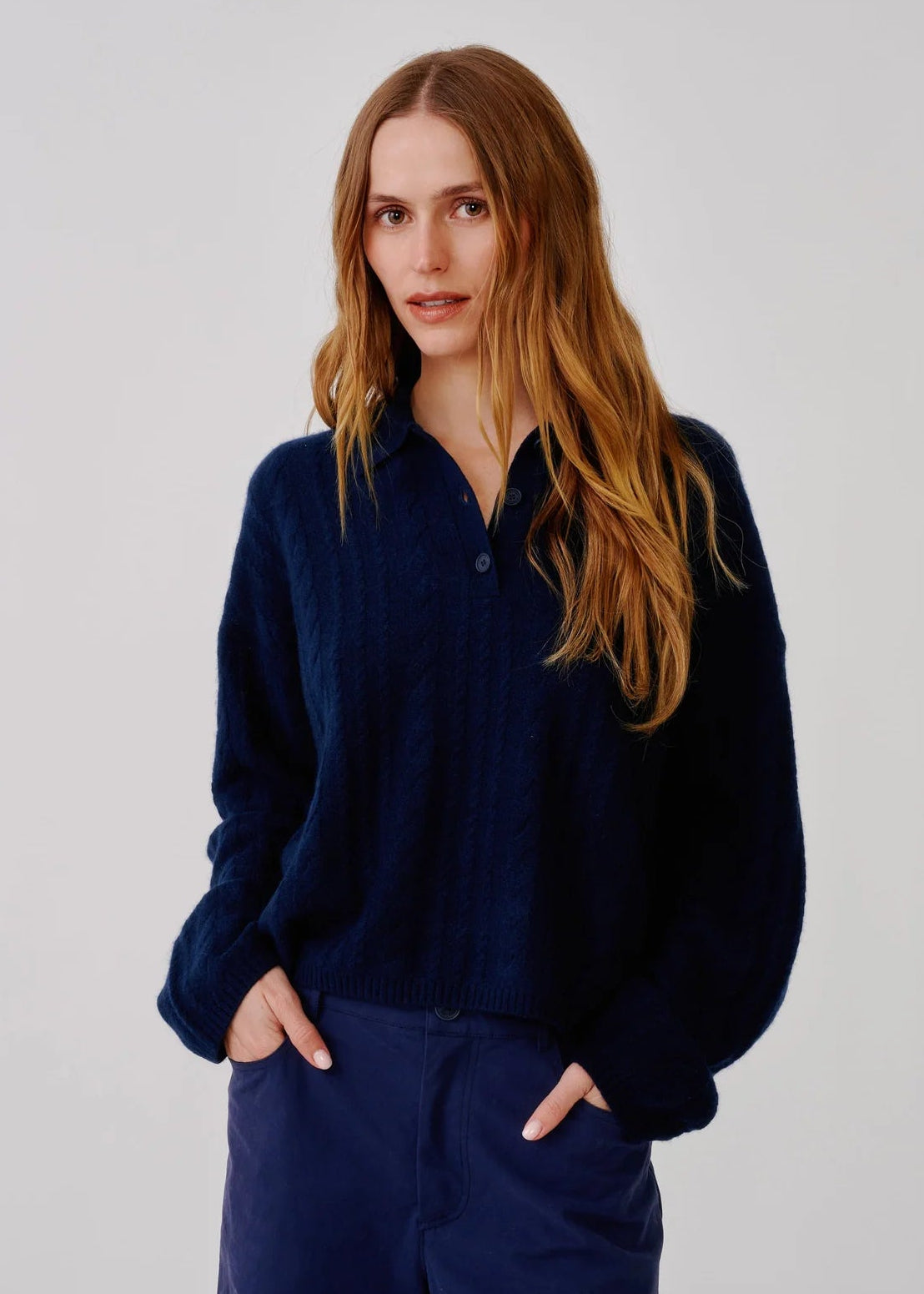 person wearing sablyn womens Elsie C Relaxed Cashmere Polo in Midnight Navy