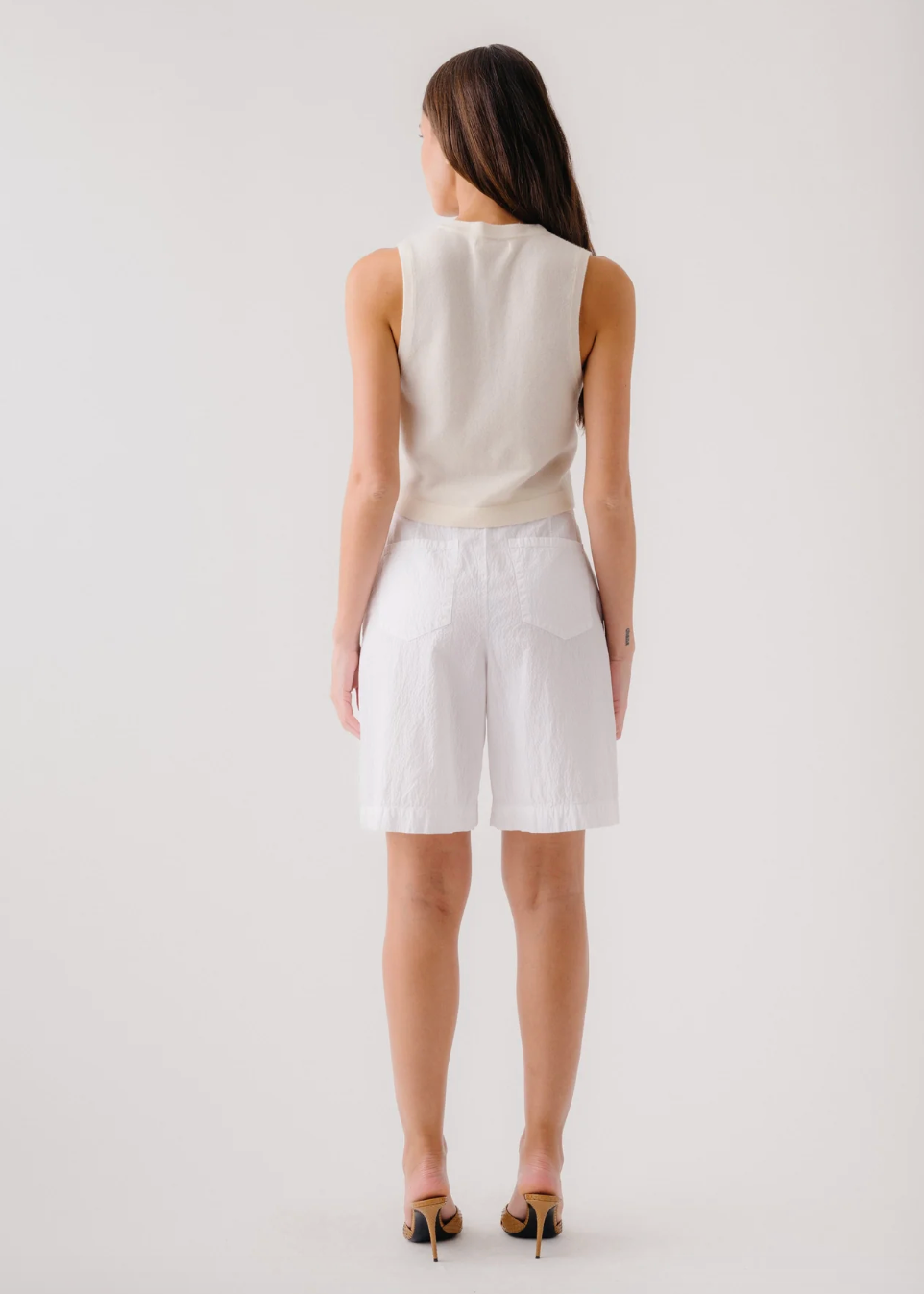 person wearing sablyn womens Gemma Seersucker Cinched Longer Shorts in white