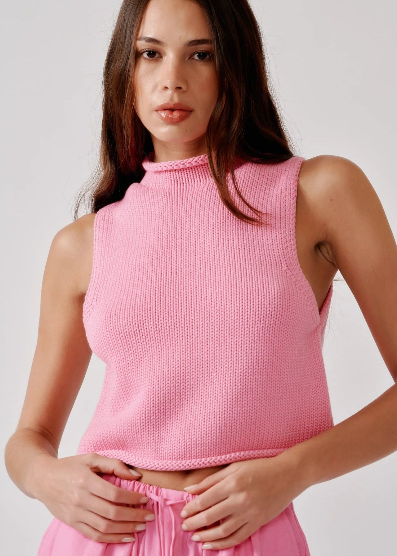 person wearing sablyn womens Giada Roll Neck Tank in Dahlia Pink