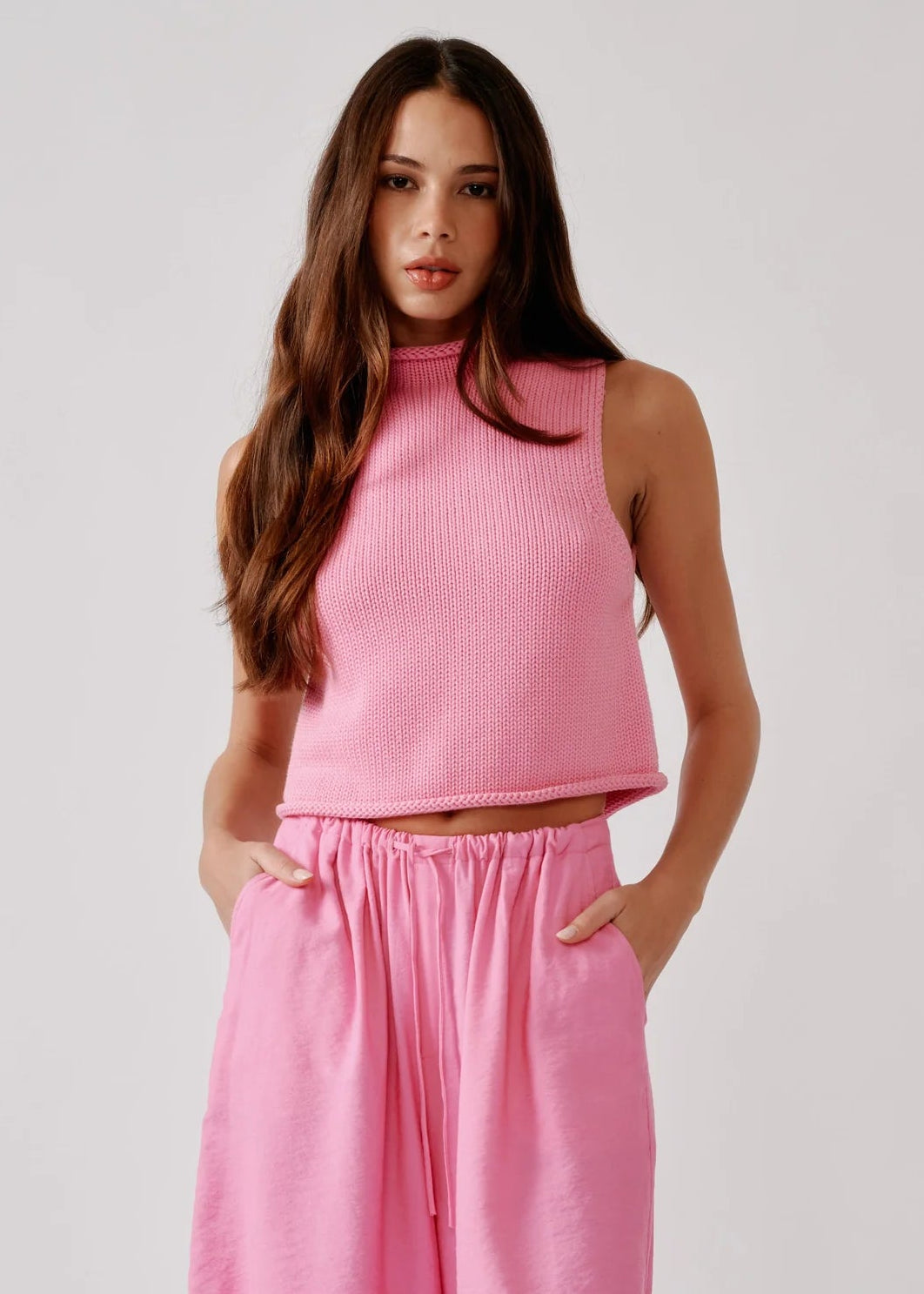 person wearing sablyn womens Giada Roll Neck Tank in Dahlia Pink
