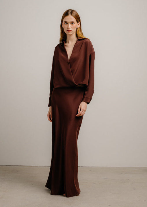 person wearing sablyn womens Grace C Scallop Trim Bias Cut Maxi Skirt in Cinnabar silk