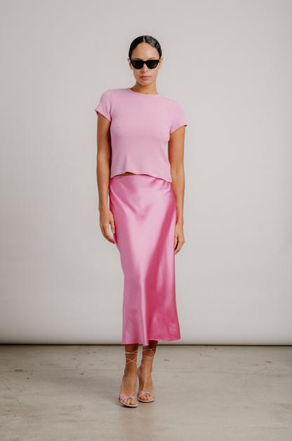 person wearing sablyn womens Miranda B Scallop Trim Bias Cut Skirt in Dahlia pink