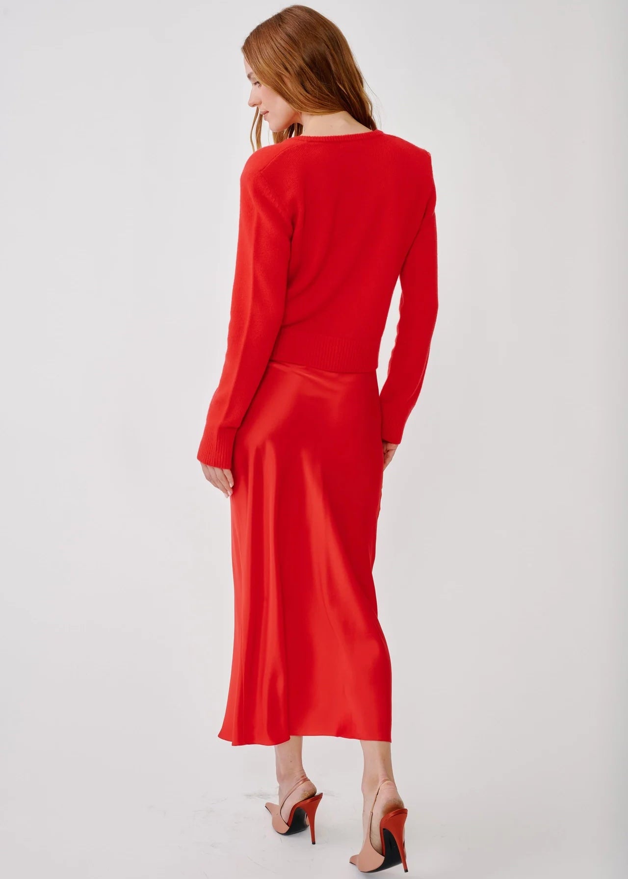person wearing sablyn womens Miranda B Scallop Trim Bias Cut Skirt in Scarlet red