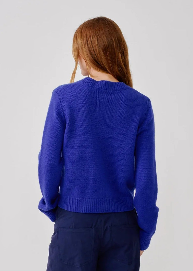 person wearing sablyn womens Noa Shrunken cashmere Crewneck Sweater in Cobalt Blue