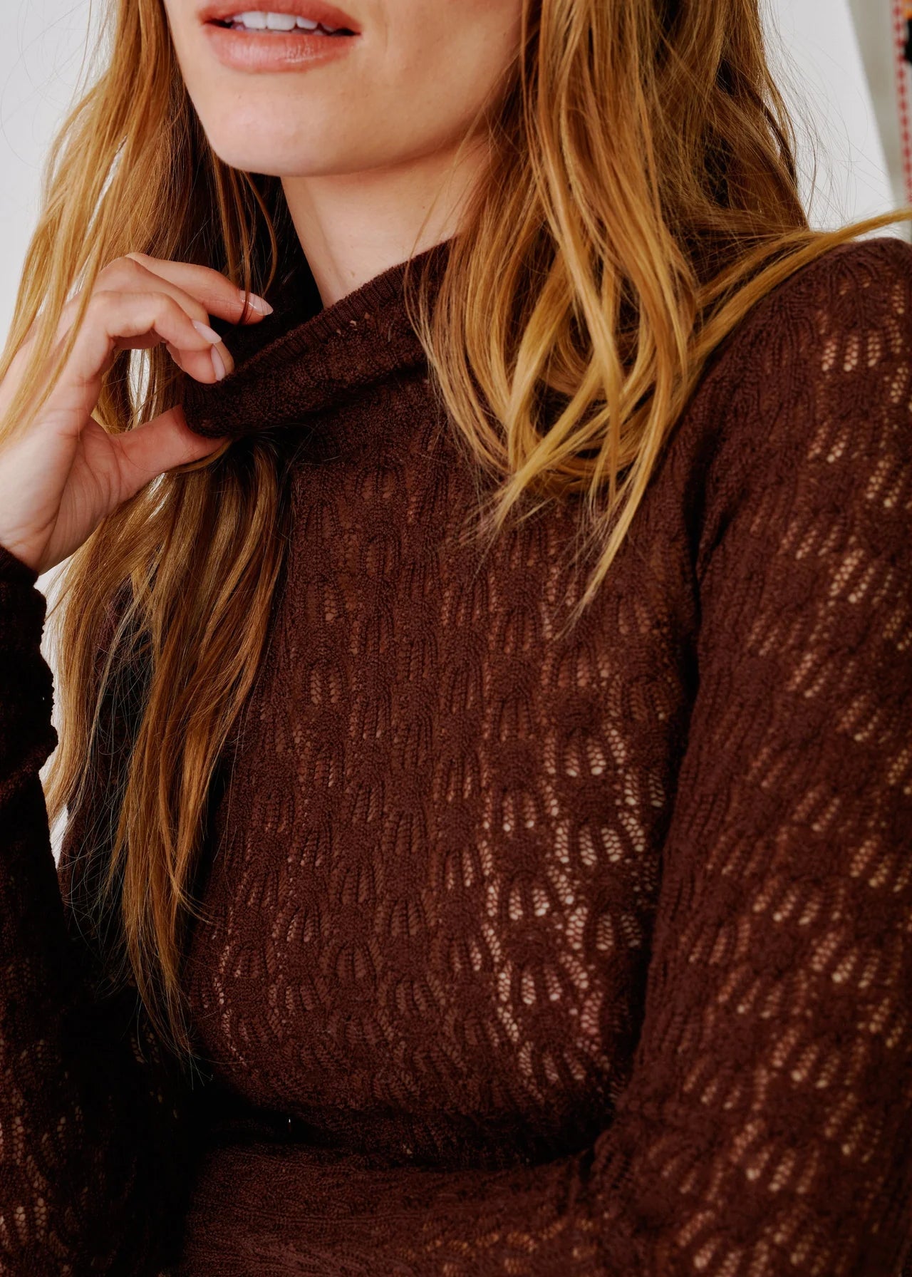 person wearing sablyn womens Rhea Mock Neck Top in Cinnabar brown lightweight wool