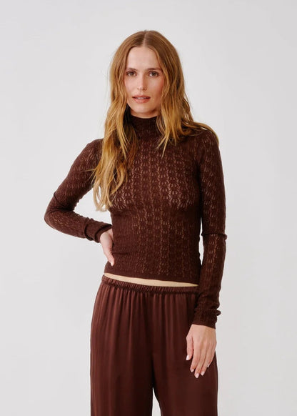 person wearing sablyn womens Rhea Mock Neck Top in Cinnabar brown lightweight wool