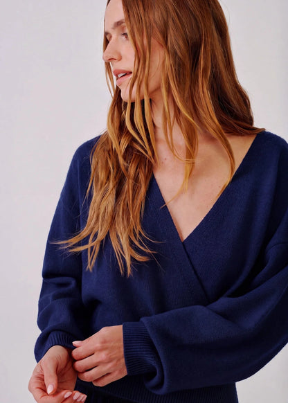 person wearing sablyn womens cashmere Koda Wrap Cashmere Sweater in Midnight Navy