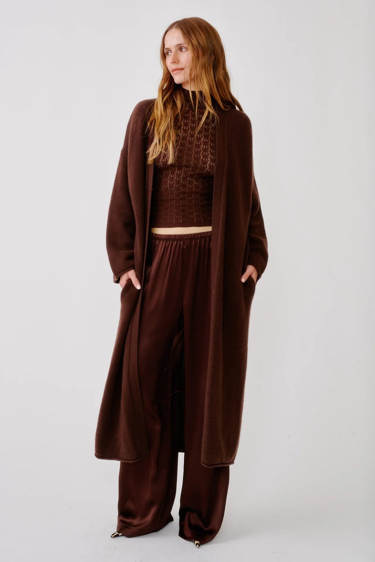 person wearing sablyn womens cashmere Toma Slouchy Cashmere Duster in Cinnabar brown