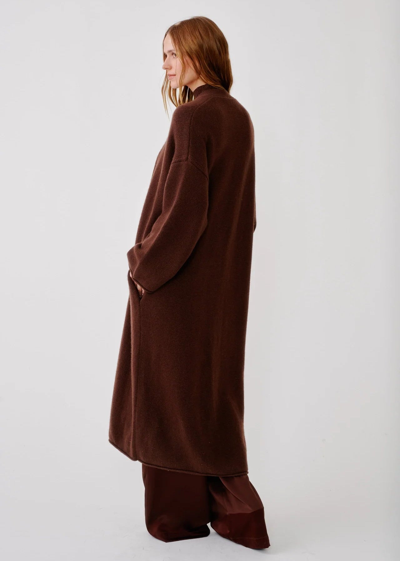 person wearing sablyn womens cashmere Toma Slouchy Cashmere Duster in Cinnabar brown