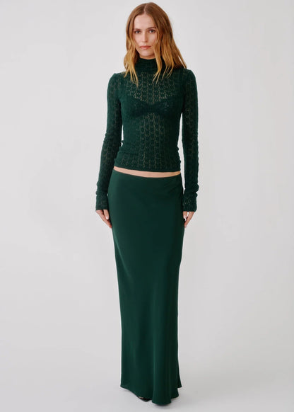 person wearing salbyn womens Grace C Scallop Trim Bias Cut Maxi Skirt in Hunter Green