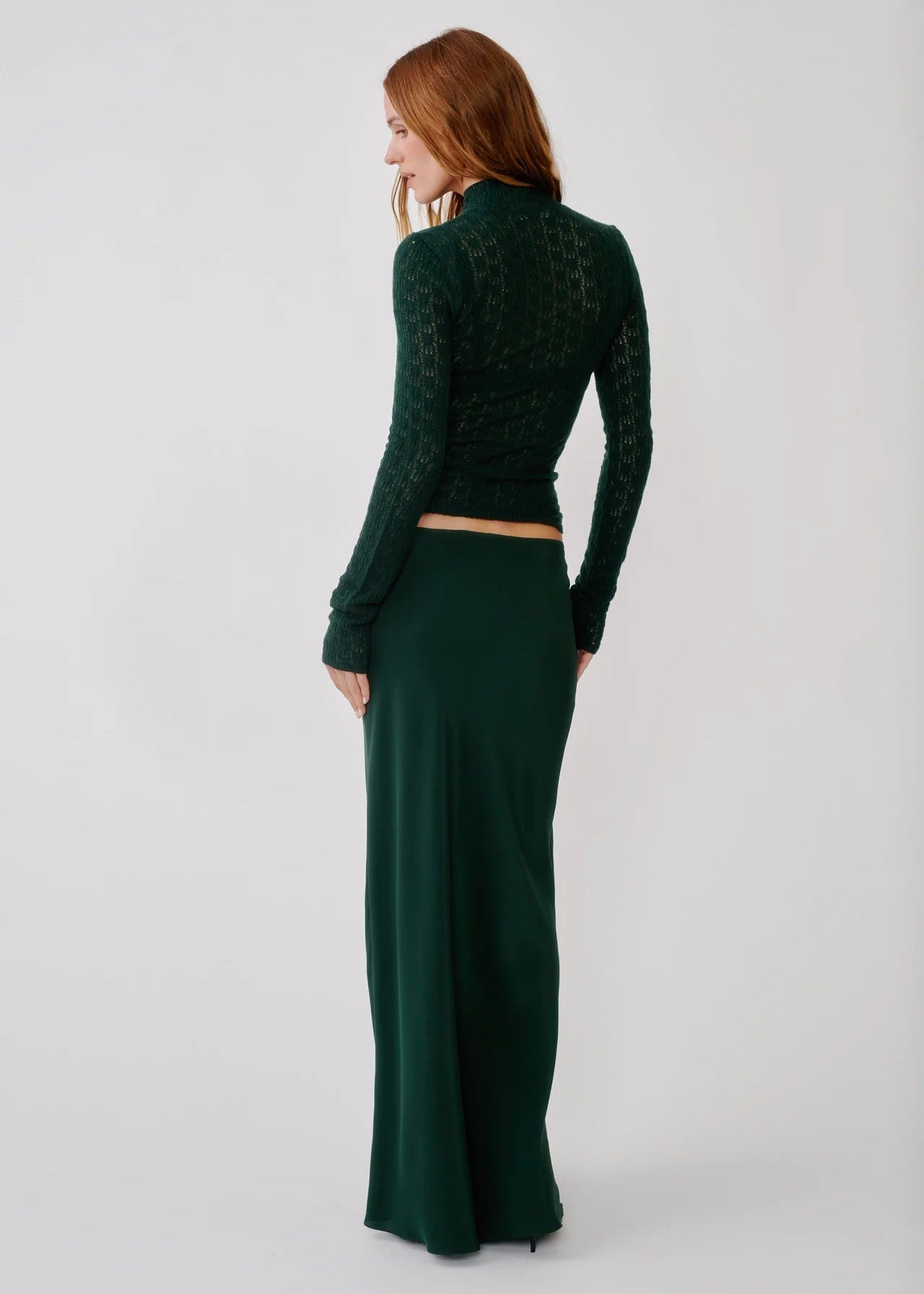 person wearing salbyn womens Grace C Scallop Trim Bias Cut Maxi Skirt in Hunter Green