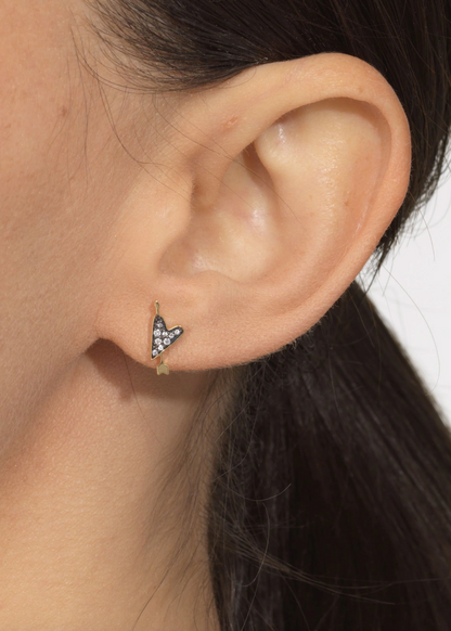 person wearing sorellina fine jewelry 18k yellow gold Heart Motif Studs