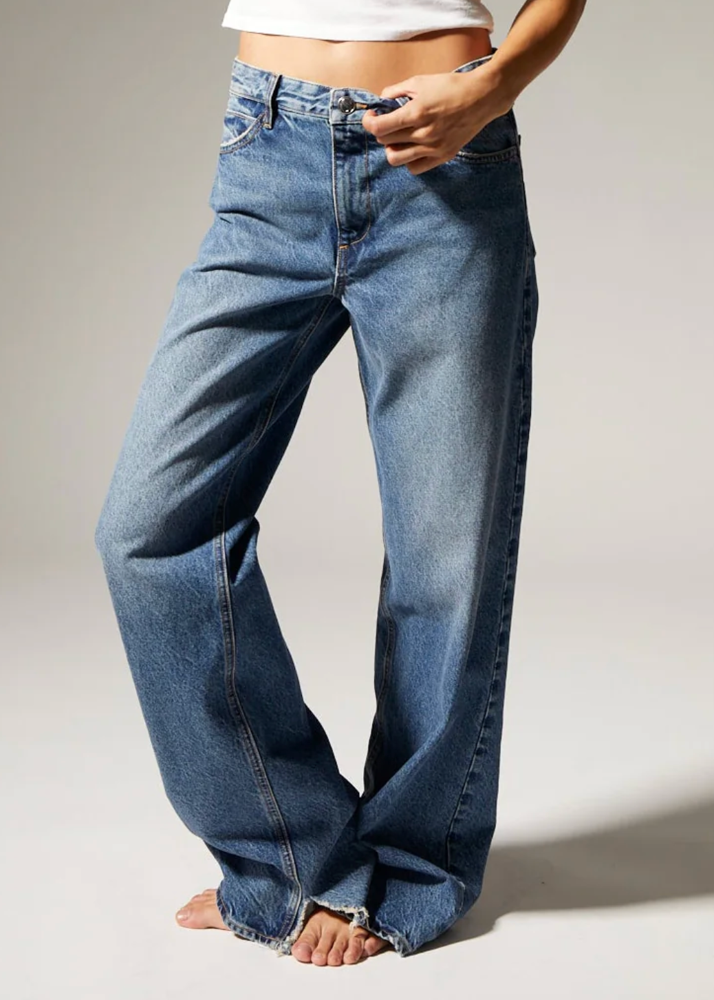person wearing sprwmn 5 Pocket Baggy Denim in Eva