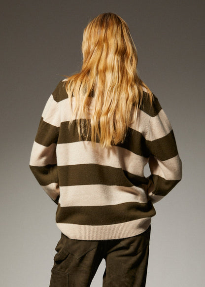 person wearing sprwmn Cashmere Polo Sweater in Olive Stripe