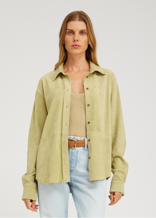 person wearing sprwmn Elise Suede Button Up Shirt in Pistachio