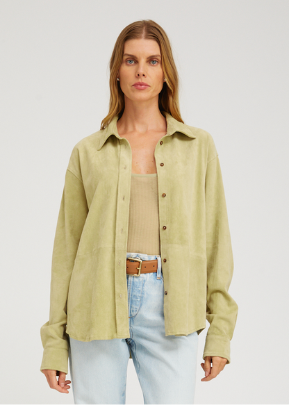 person wearing sprwmn Elise Suede Button Up Shirt in Pistachio