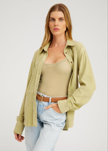 person wearing sprwmn Elise Suede Button Up Shirt in Pistachio