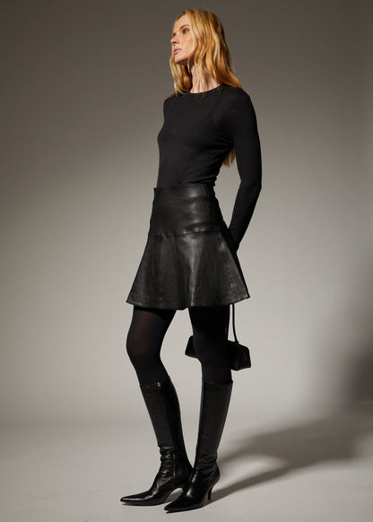 person wearing sprwmn womens Black Leather Jane Skirt