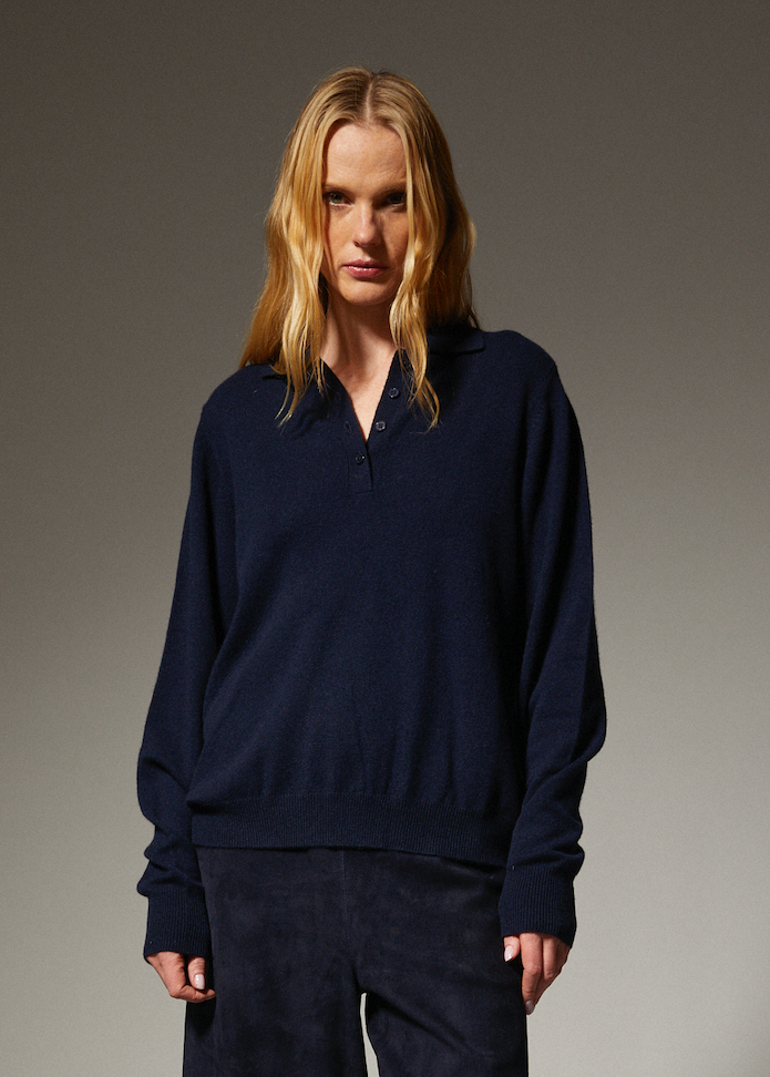 person wearing sprwmn womens Cashmere Polo Sweater in Navy