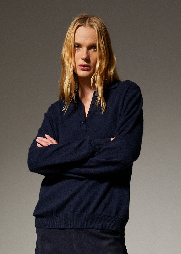 person wearing sprwmn womens Cashmere Polo Sweater in Navy