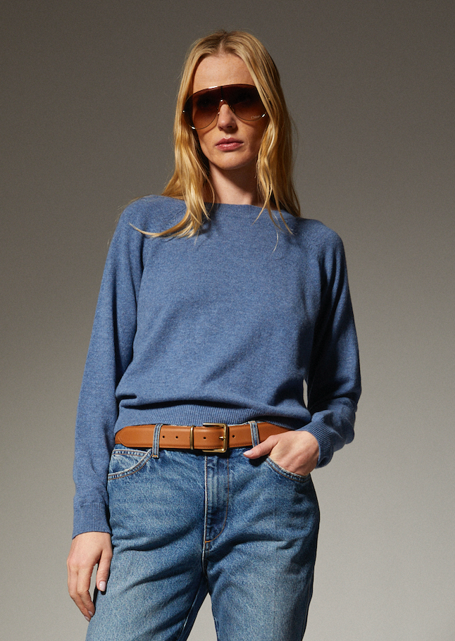 person wearing sprwmn womens Cashmere Raglan Sweater in Chambray Blue