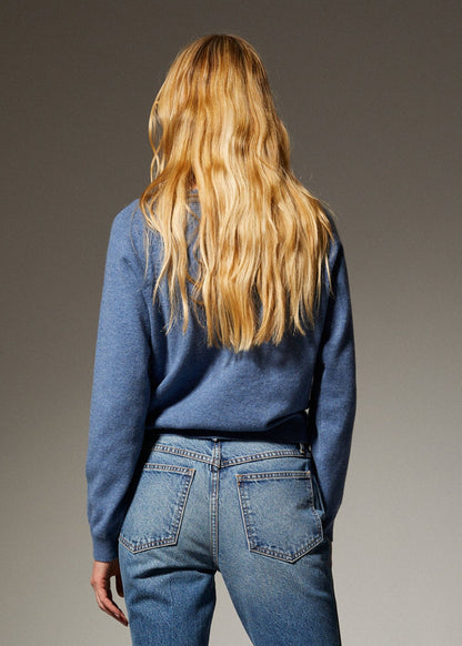 person wearing sprwmn womens Cashmere Raglan Sweater in Chambray Blue