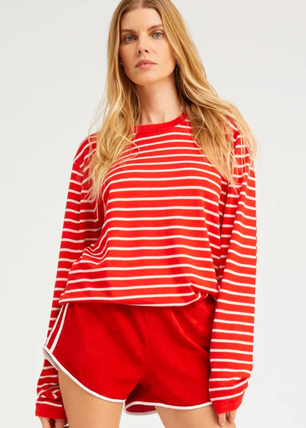 person wearing sprwmn womens Long Sleeve Cashmere Tee red stripes sweater