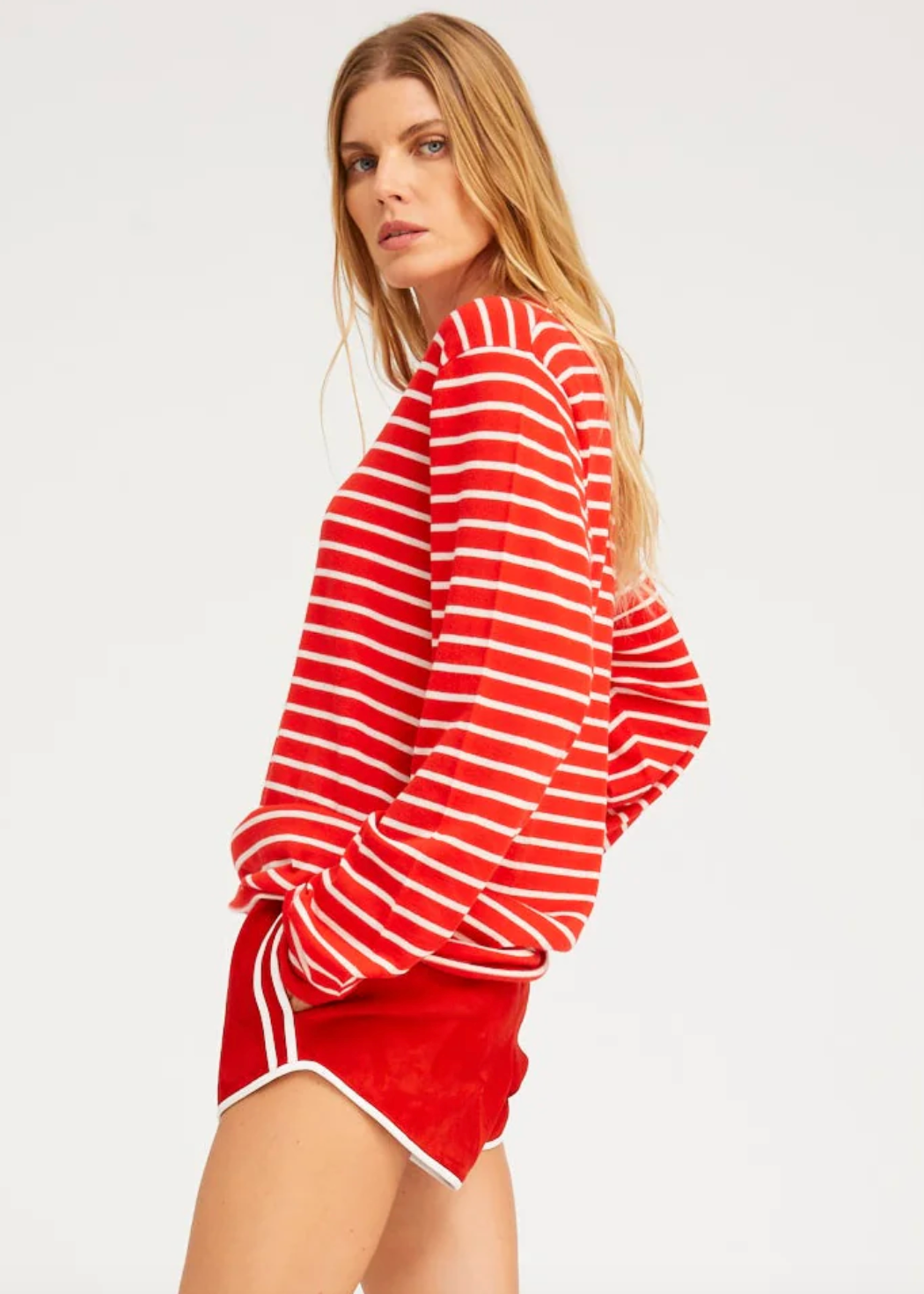 person wearing sprwmn womens Long Sleeve Cashmere Tee red stripes sweater