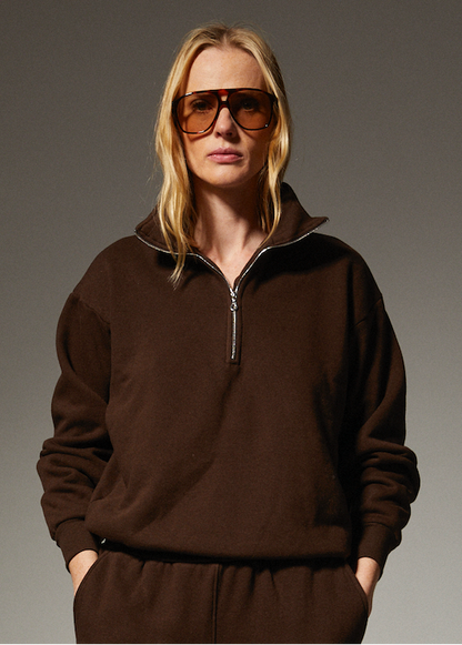 person wearing sprwmn womens Quarter Zip Sweatshirt in Americano brown