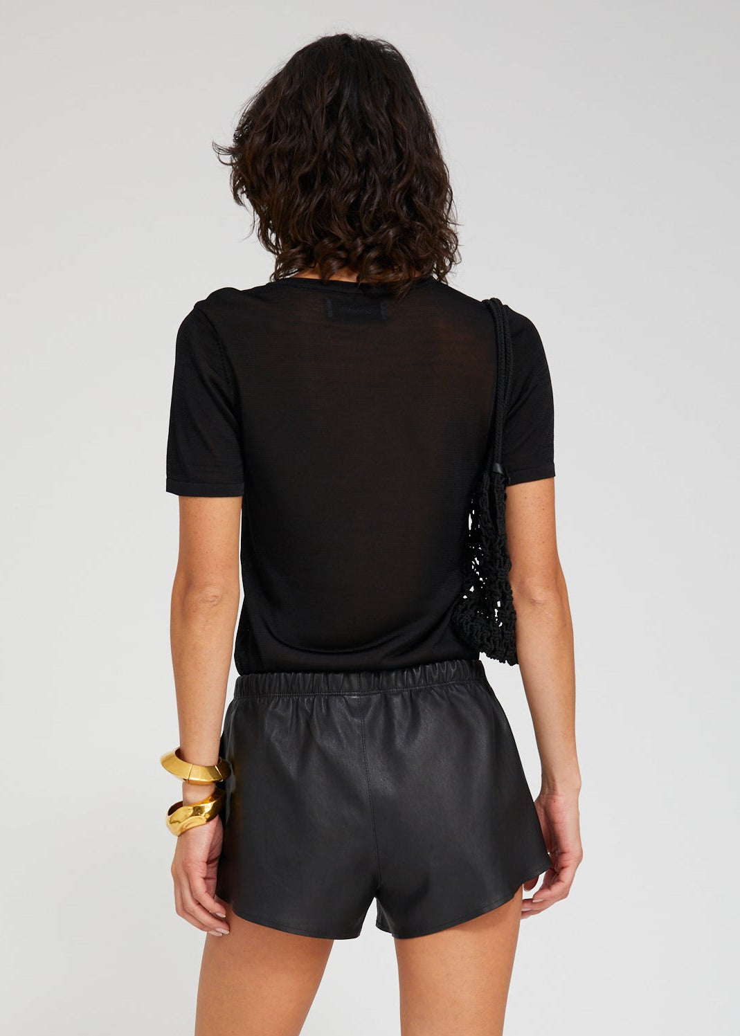 person wearing sprwmn womens Silky Jersey Classic Tee in Black
