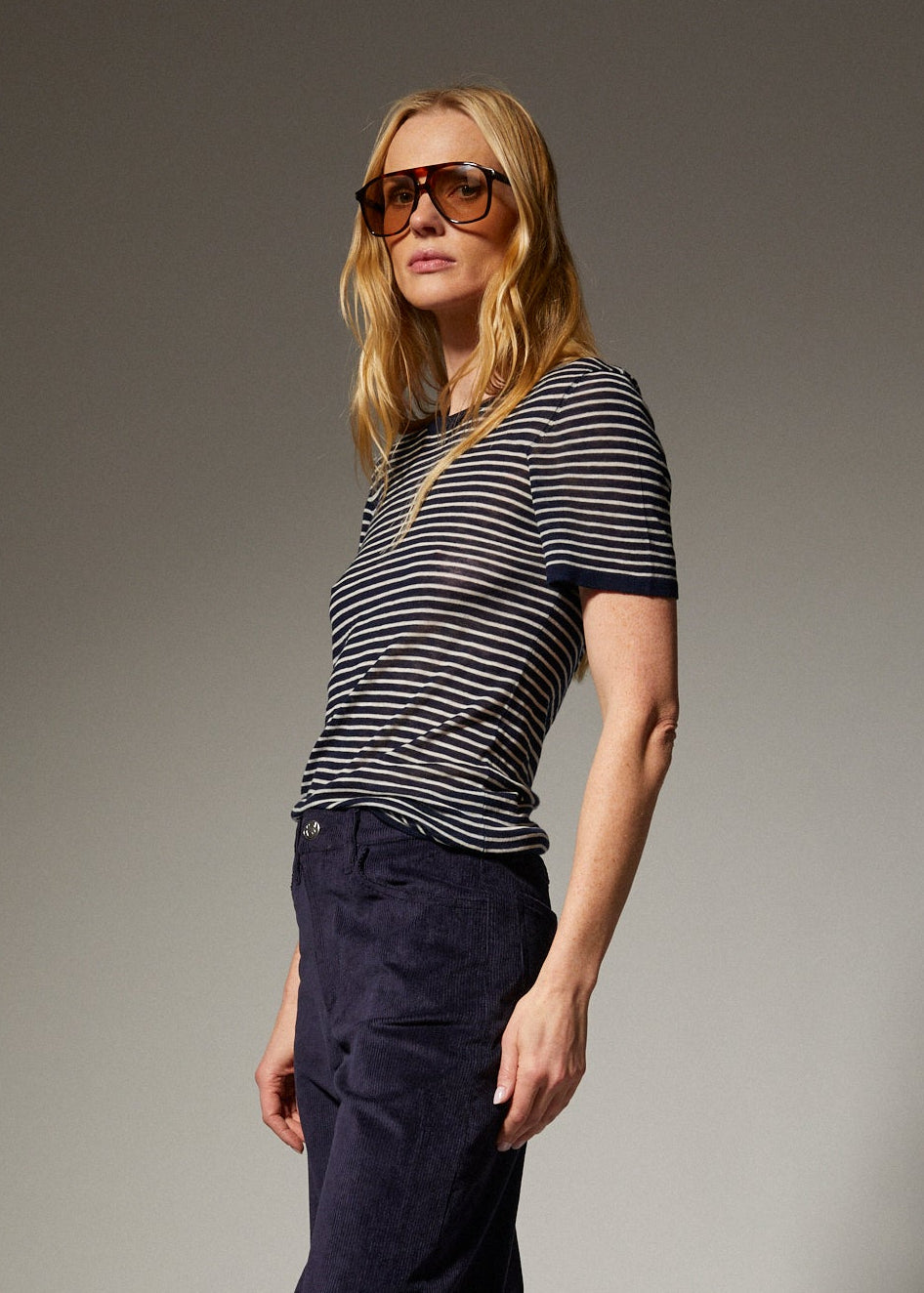 person wearing sprwmn womens Tissue Classic Short Sleeve Tee in Navy Mini Stripes