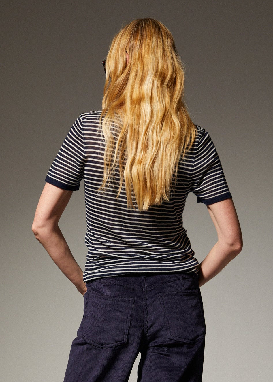 person wearing sprwmn womens Tissue Classic Short Sleeve Tee in Navy Mini Stripes