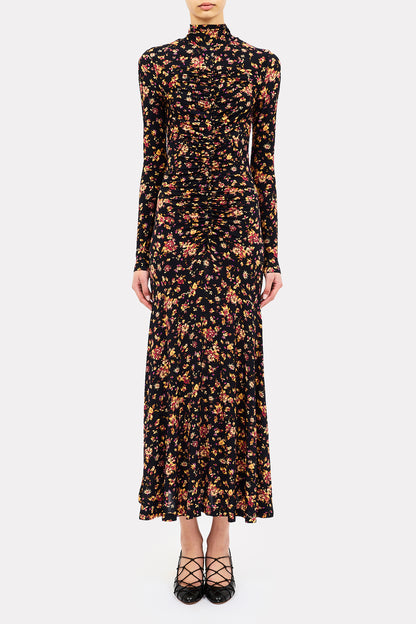 person wearing ulla johnson womens Ida Long Sleeve Jersey Dress in Noir Floral
