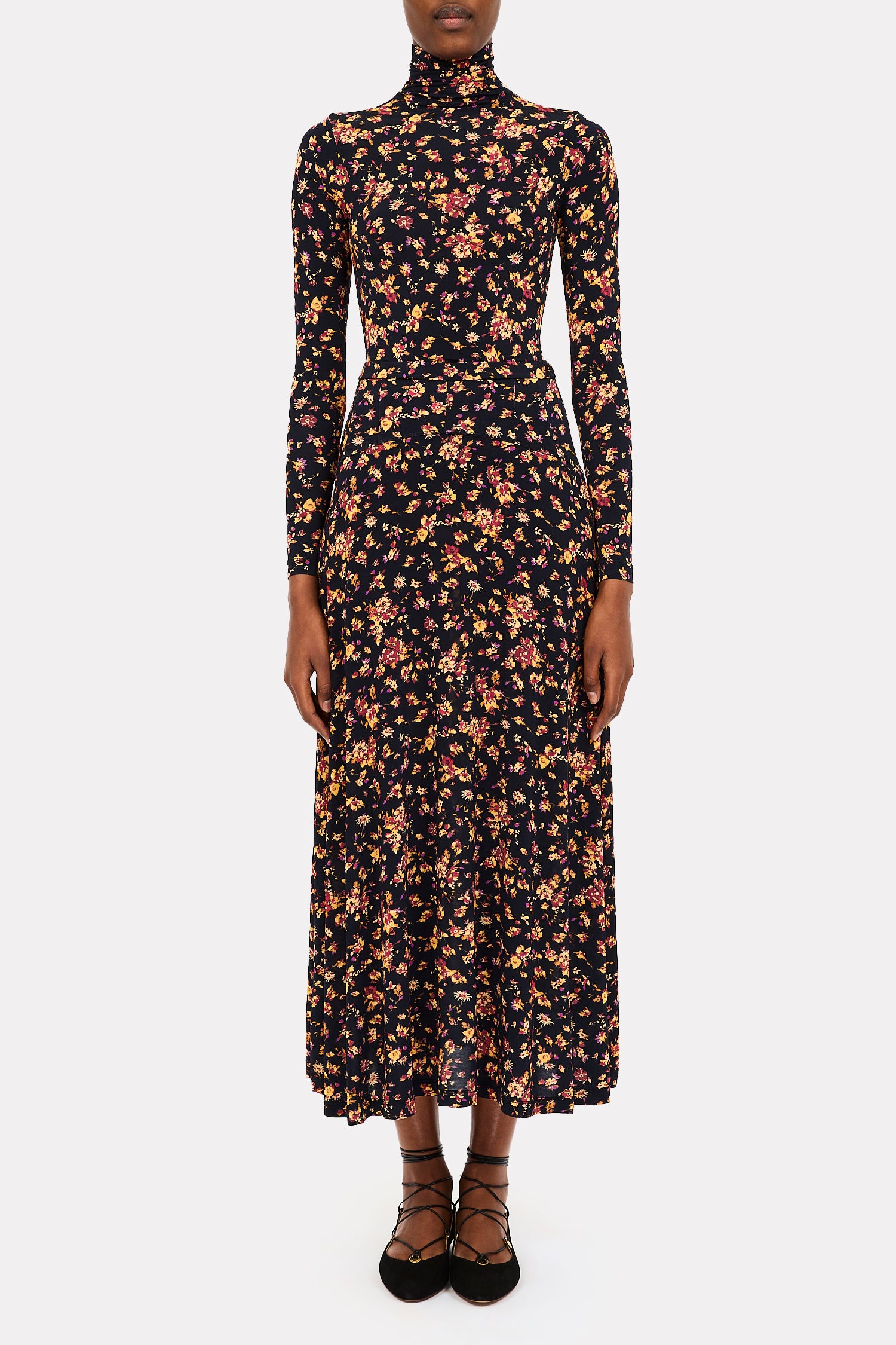 person wearing ulla johnson womens Paola Jersey Skirt Aurelia Long Sleeve Jersey Top n Noir Floral 