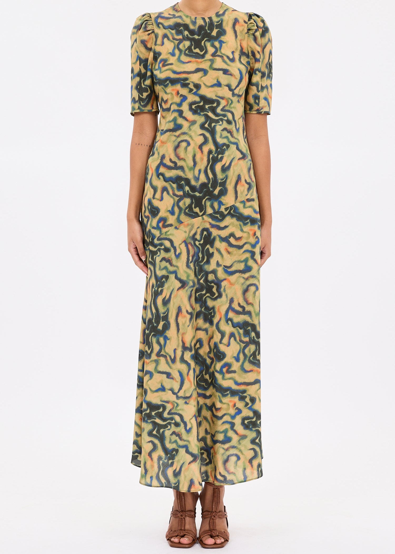 person wearing ulla johnson womens Samar Multicolored Puff Sleeve silk Midi Dress geode print