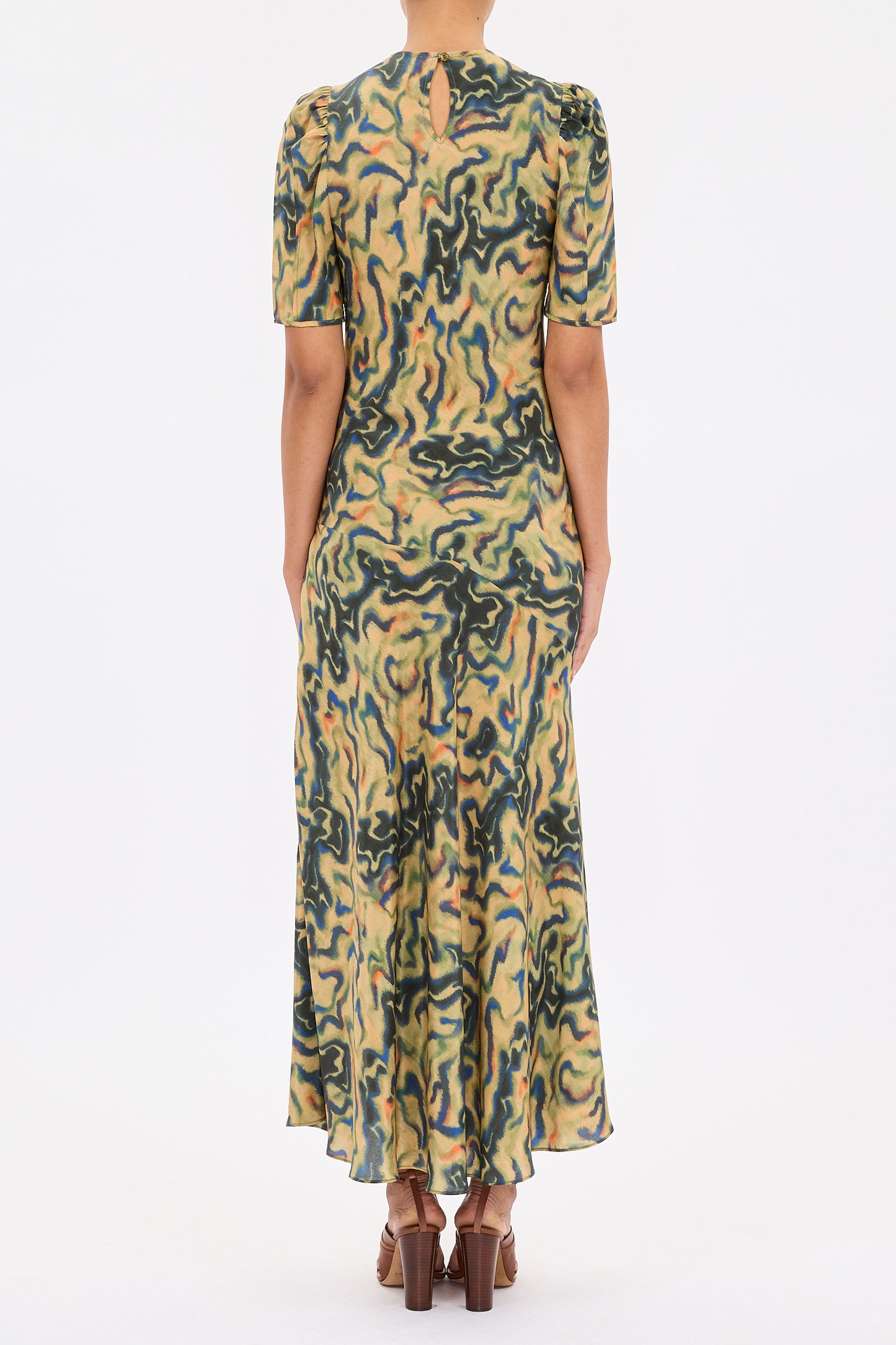 person wearing ulla johnson womens Samar Multicolored Puff Sleeve silk Midi Dress geode print