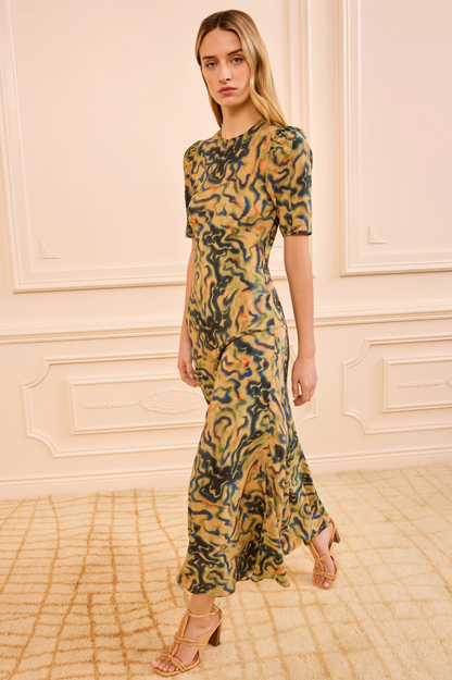 person wearing ulla johnson womens Samar Multicolored Puff Sleeve silk Midi Dress geode print