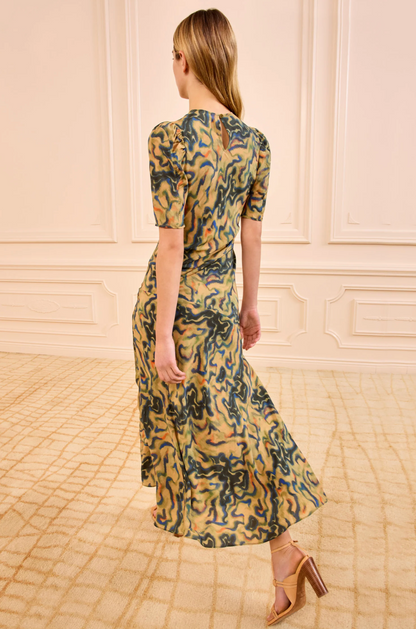 person wearing ulla johnson womens Samar Multicolored Puff Sleeve silk Midi Dress geode print